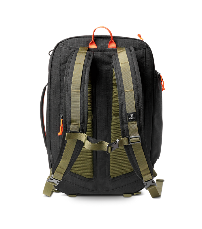 A man with the Roark 3 Day Fixer Bag slung over his shoulder, ready for his next journey.