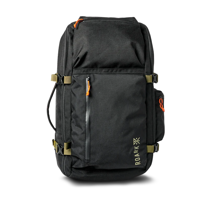 Detail shot of the Roark 5 Day Mule 55L duffel bag in black, highlighting the woven brand label.