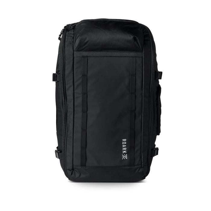 Open Roark Accomplice Mule 45L duffel bag in black, revealing its organized interior with multiple compartments and pockets.