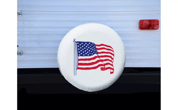 White Vinyl RV Spare Tire Cover with American Flag Design Installed on Trailer - Front View | United RV Parts