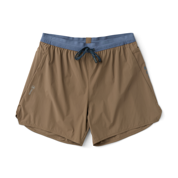 Backpack and boardshorts ready for adventure, essential gear for travel and outdoor activities by Roark