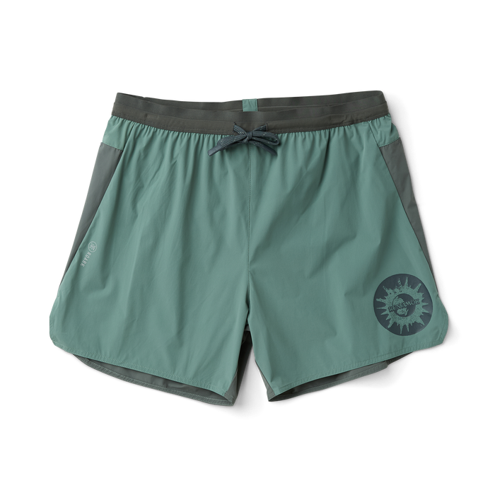 Versatile Roark outdoor apparel assortment featuring denim, boardshorts, and a windbreaker, ideal for adventure and travel.