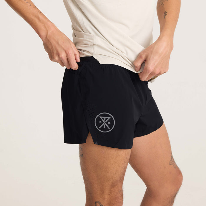Close-up of black running shorts highlighting soft, durable fabric and subtle reflective design for enhanced visibility and style.