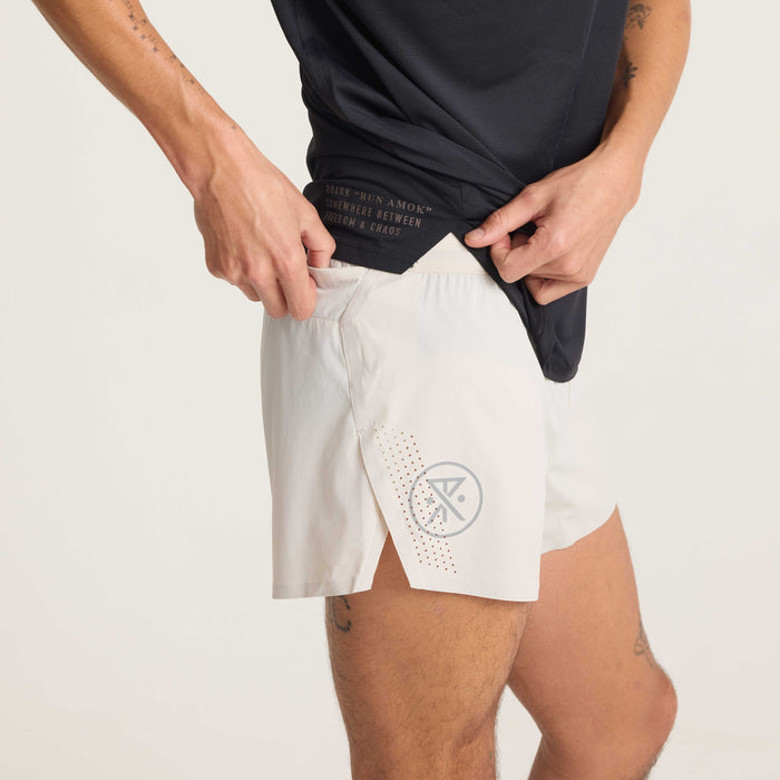 Detailed close-up of lightweight beige fabric showing its textured, breathable, and quick-drying properties.