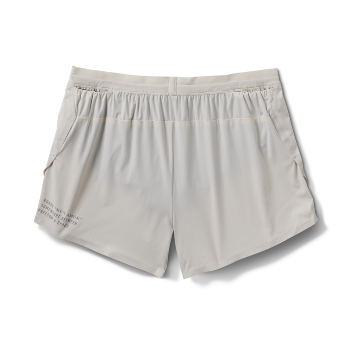Back view of beige running shorts featuring sleek design, lightweight material, and functional pockets for convenience.