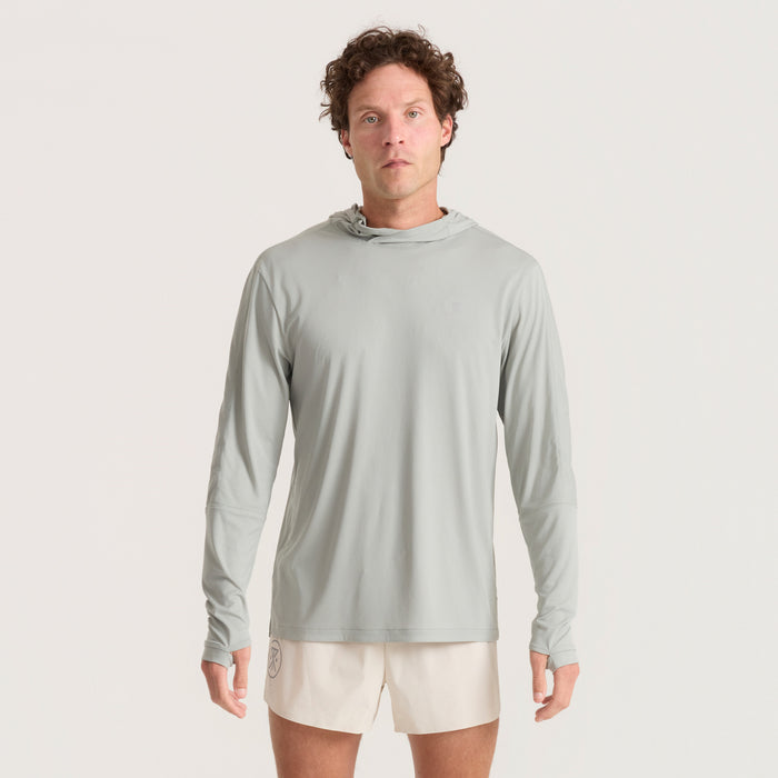Active individual in long-sleeved t-shirt and pants geared up for adventure, showcasing the functionality and style of outdoor active wear.