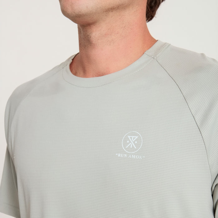 Long-sleeved active shirt with visible stitching and rugged design, ideal for outdoor and adventure activities.