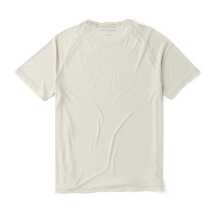 Close-up of a white active shirt with visible sleeve texture designed for outdoor and adventure wear by Roark.