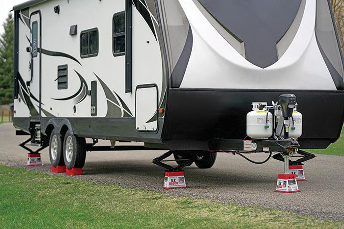 Multiple Andersen EZ Blocks Supporting Travel Trailer Stabilizers | United RV Parts