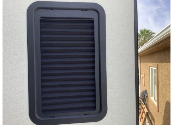 Black Entry Door Window Shade - Fully Closed Position Exterior View | United RV Parts