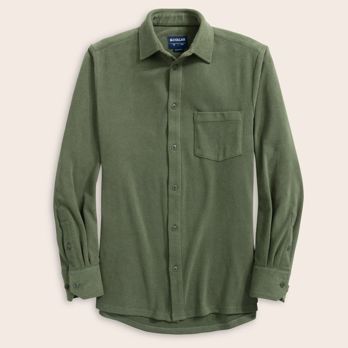 Pine button-up flannel shirt with a pocket on a beige background