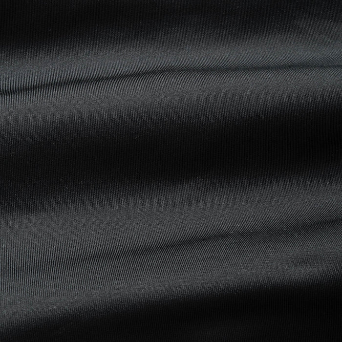 Close-up of jet black fabric with visible texture