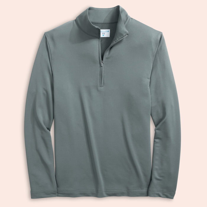 Steel gray long-sleeve quarter zip on a light pink background