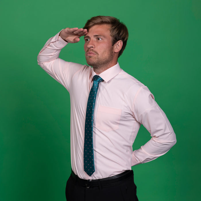 Teal tie with pink floral pattern on pink shirt