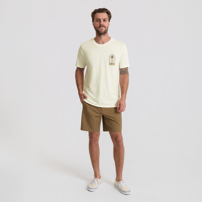 Off-white Augs Palm Premium Tee with small chest graphic, worn by male model with khaki shorts and white sneakers