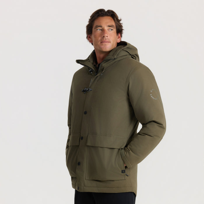 Olive green Axeman Parka Jacket with hood and button front worn by man in three-quarter view pose against white background