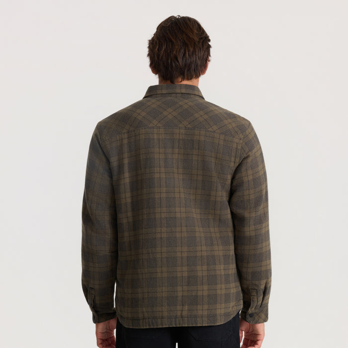 Backwoods Jacket in military green plaid, shown from behind on male model against neutral background