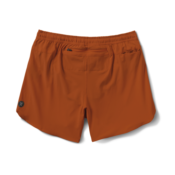 Vibrant orange active rugby shorts designed for adventure and outdoor activities, showcasing Roark's commitment to durable and functional travel wear.