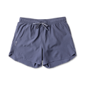 Assorted Roark adventure-ready shorts including active shorts, trunks, and Bermuda shorts displayed against an outdoor backdrop, ideal for travel and exploration.