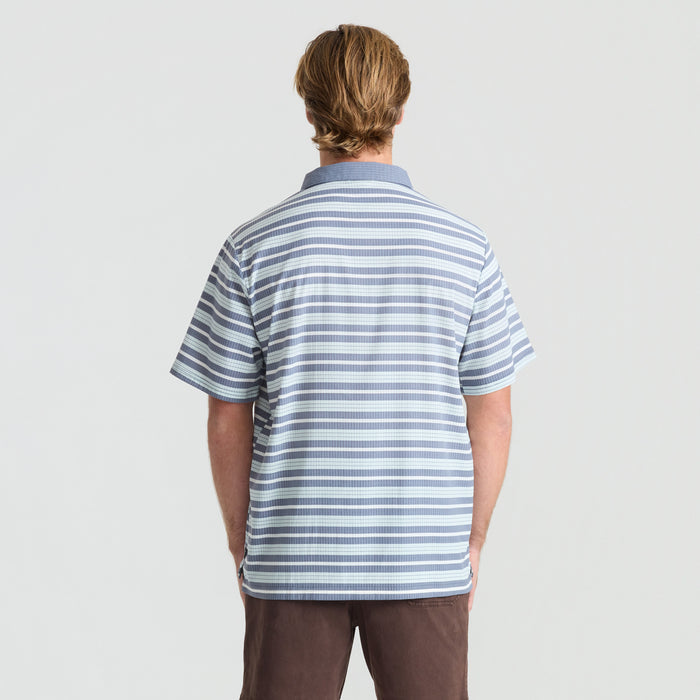 Detail of Roark adventure gear fabric with unique pattern in natural setting, emphasizing durability and style for outdoor activities.