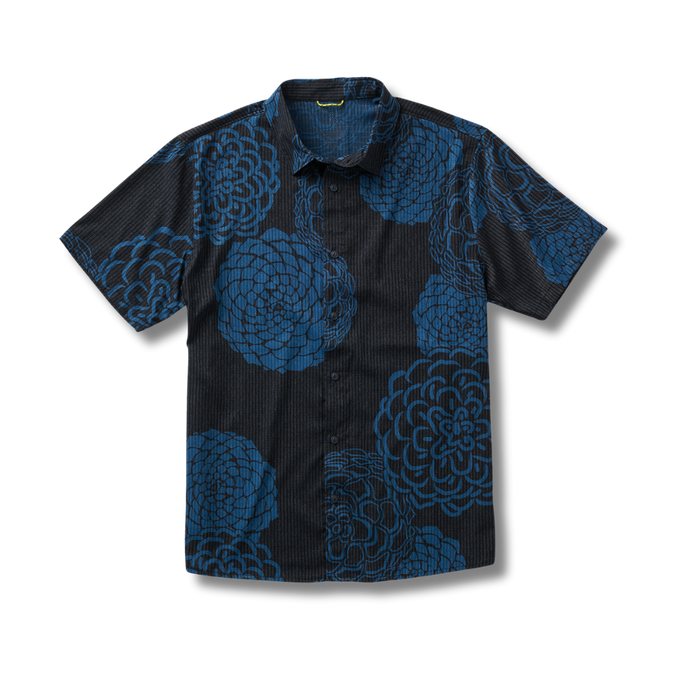 Close-up detail of a Roark active adventure shirt featuring a distinctive pattern, collar, and buttons, ideal for outdoor enthusiasts.