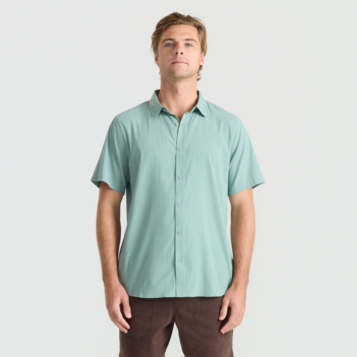 Stylish adventure-ready shirt featuring detailed collar, buttons, and sleeves, perfect for travel and outdoor activities.