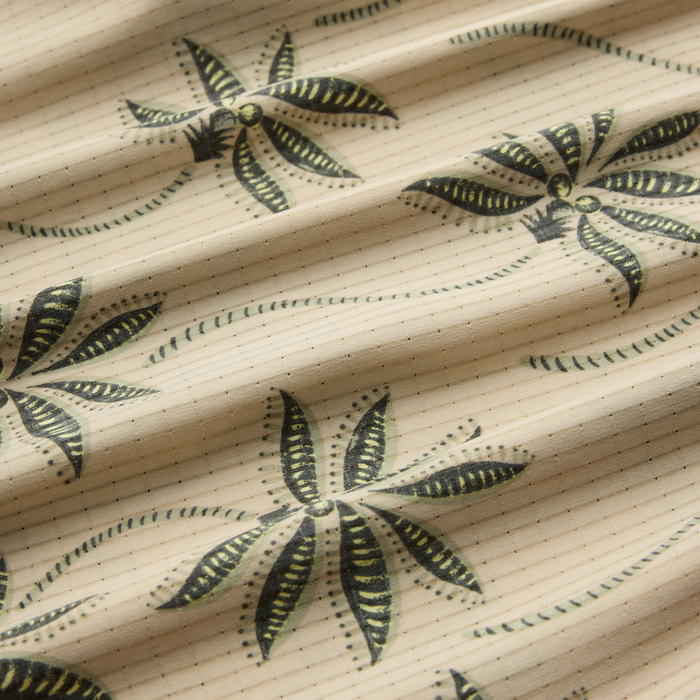 Abstract pattern design on linens featuring motifs ideal for adventure and travel-themed decor.