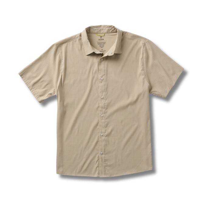 Close-up of an outdoor adventure shirt featuring a detailed collar and button design, perfect for travel and exploration.