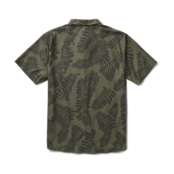 Close-up of a stylish active shirt featuring a distinctive pattern and buttons, designed for adventure and travel by Roark.