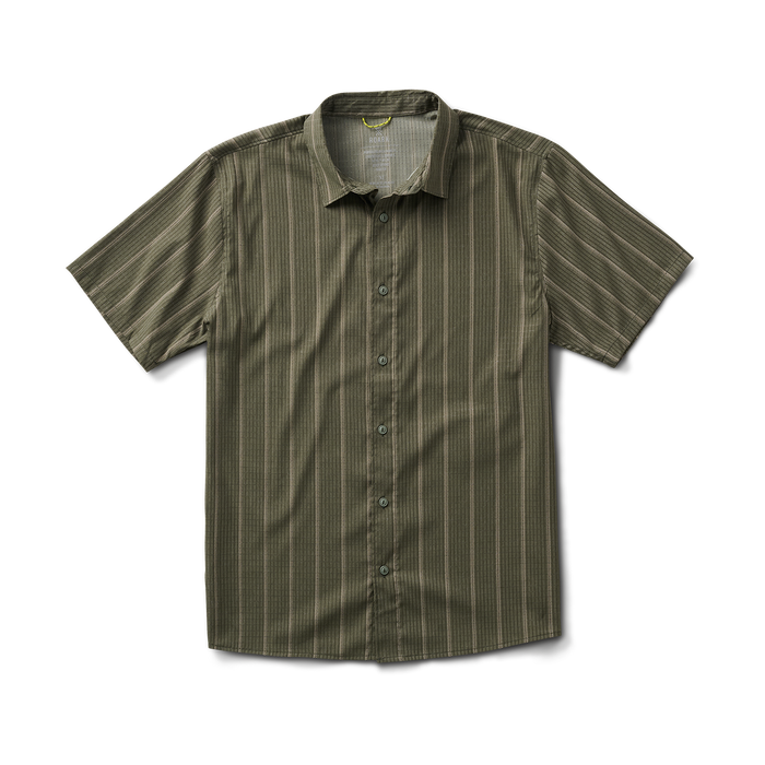 Close-up view of a versatile Roark adventure shirt featuring a collar, buttons, and designed for outdoor wear.