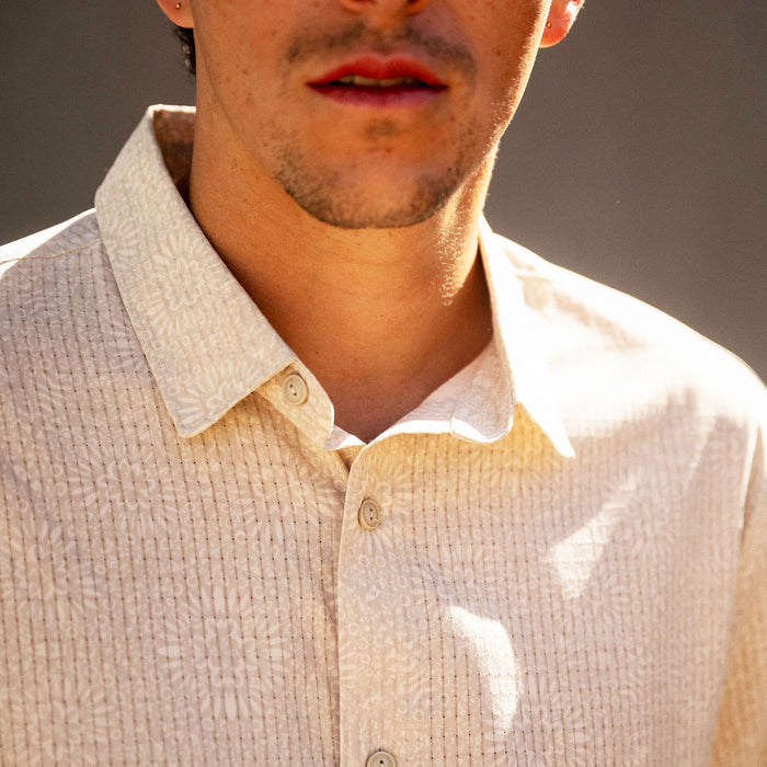 Bless Up Breathable Stretch Shirt in sand with white collar, worn by man in close-up detail shot