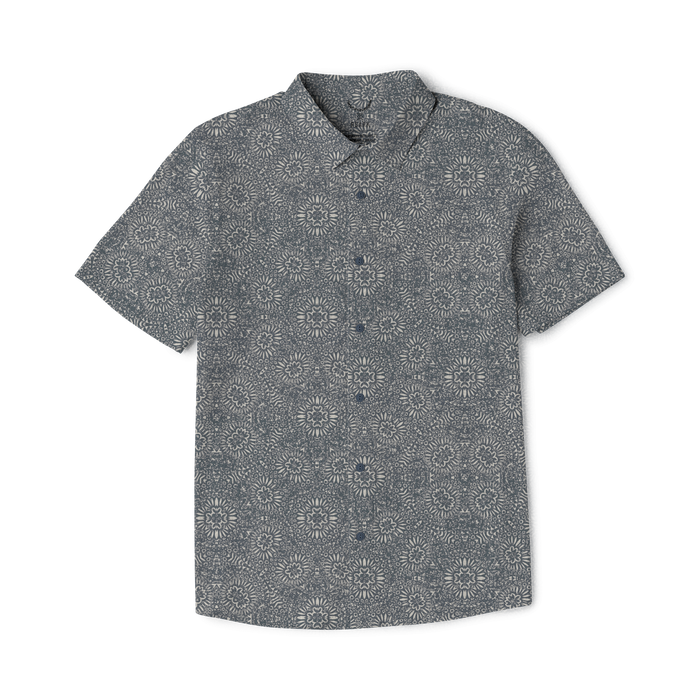 Slate gray short sleeve shirt with all-over sunflower and geometric pattern design, displayed flat on white background