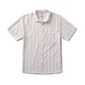 Close-up of a versatile Roark active dress shirt featuring detailed stitching on the sleeve, collar, and buttons, ideal for adventure and travel.