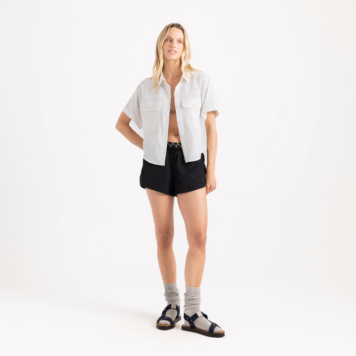 Roark adventure-ready active Bermuda shorts, ideal for travel and outdoor activities, showcased in a stylish, waist-focused fashion.