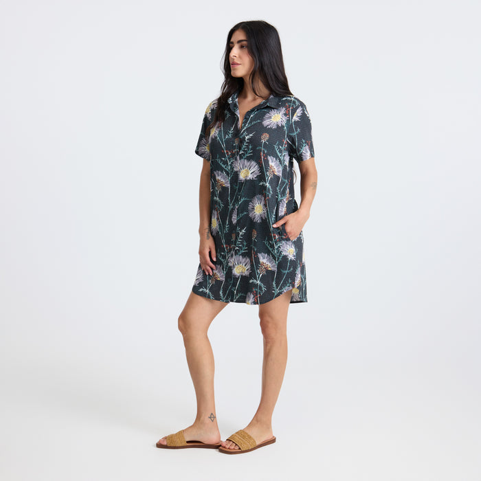 Stylish woman wearing a versatile day dress ideal for outdoor adventures by Roark.