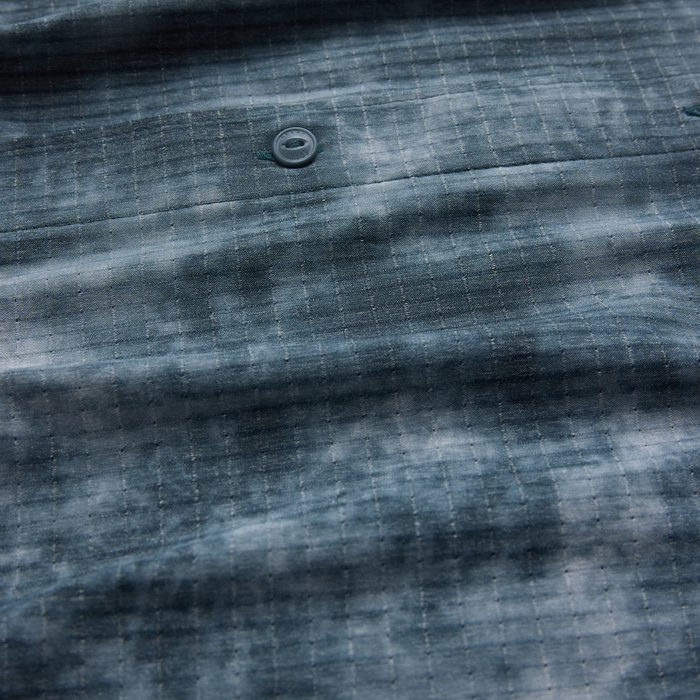 Bless Up Trail Button Up Shirt in dark slate with quilted texture and button detail, close-up flat lay view