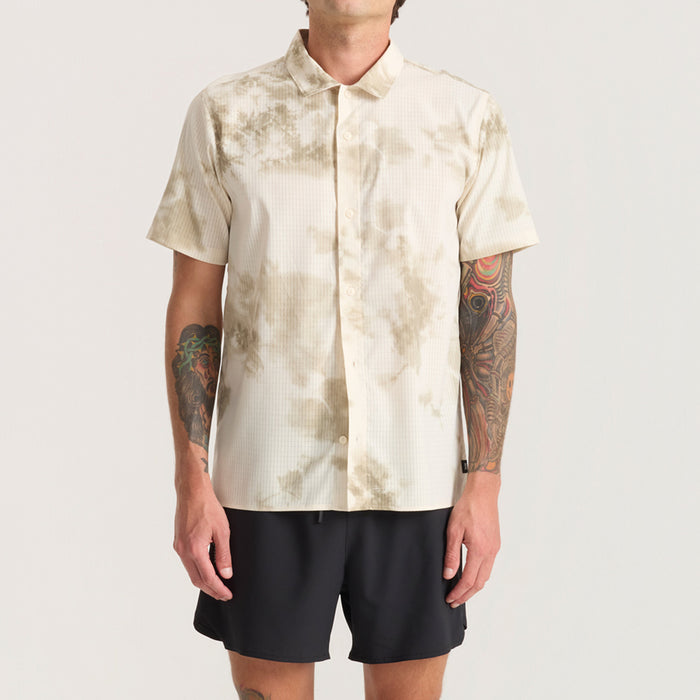 Cream tie-dye button-up short-sleeve shirt with vertical ribbed texture worn by model with black shorts