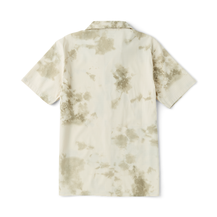 Close-up of a camouflage pattern with a military design featuring a detailed button finish, perfect for outdoor adventures and travel.