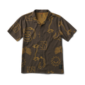 A model wearing Roark Bless Up Trail Button Up Shirt in Kaffa, relaxed style.