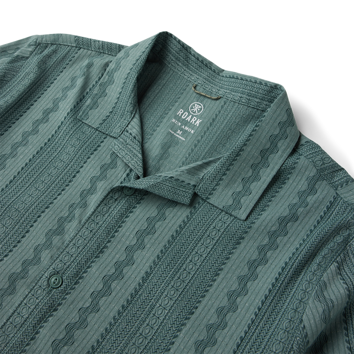 Roark Bless Up Trail button up shirt in slate green with geometric stripe pattern, shown flat lay detail shot