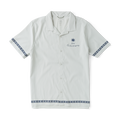 Close-up of a versatile Roark silver dress shirt featuring detailed stitching on sleeve, collar, and buttons, ideal for both active and formal occasions.