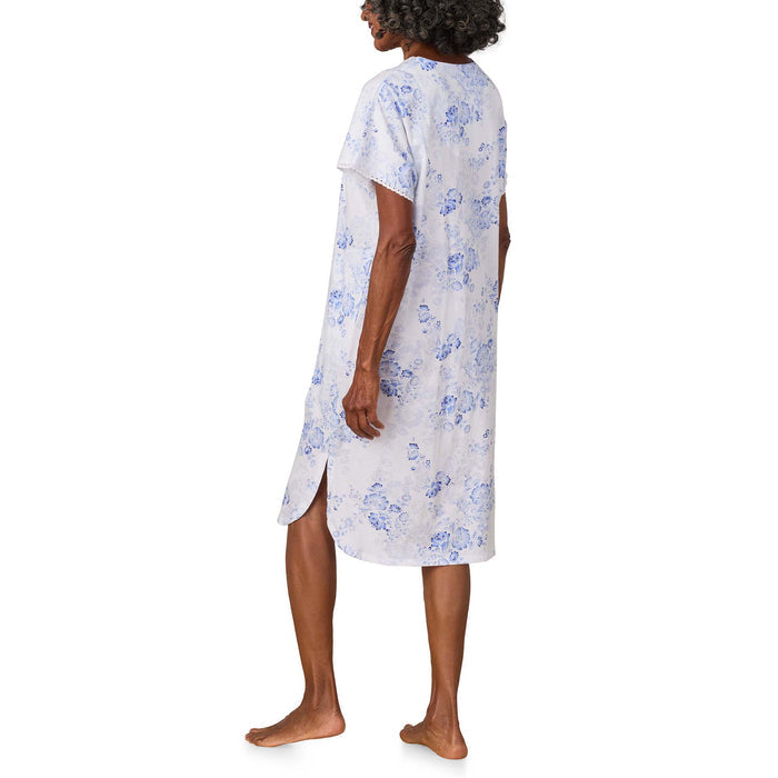 A lady wearing Blue Floral Cotton Jersey Kaftan