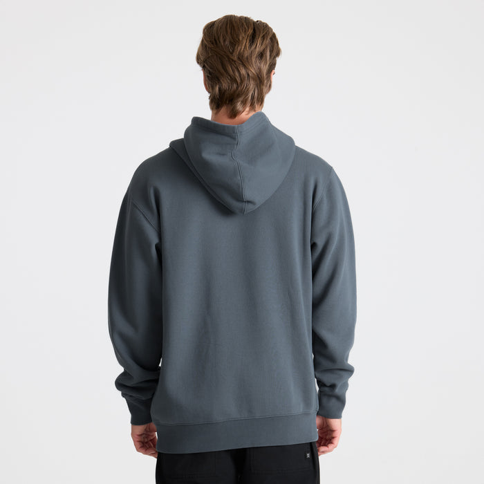 Hood detail of an outdoor adventure jacket by Roark, designed for durability and style in travel and exploration settings.