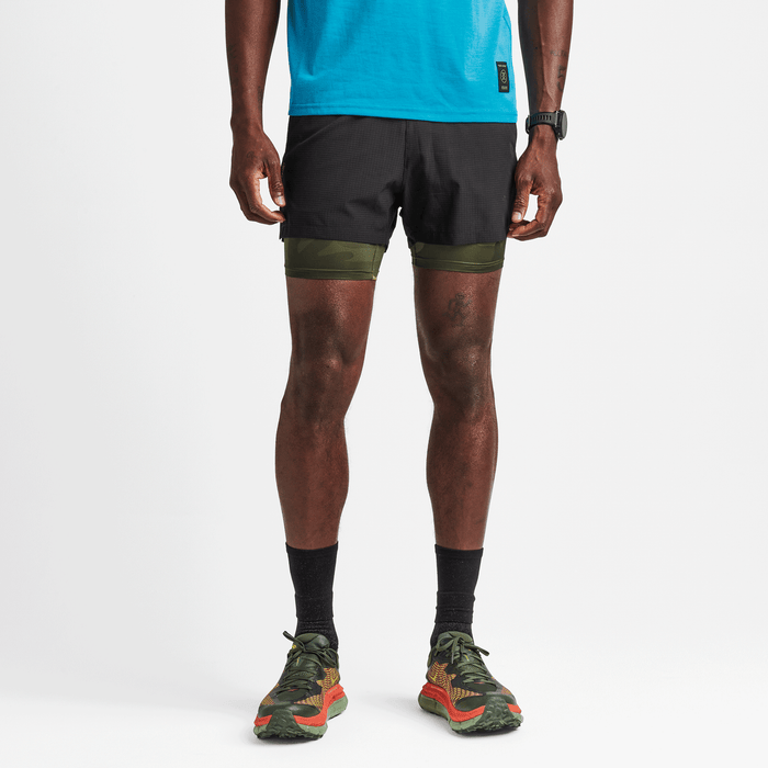 Detail shot of the Roark Bommer 3.5" Shorts in Black, highlighting their lightweight and breathable fabric, ideal for warm weather.