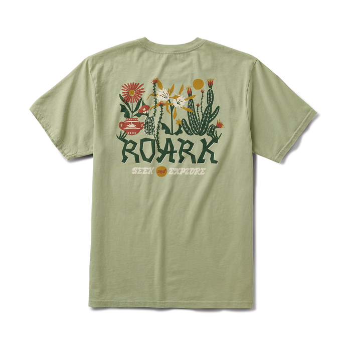 Stylish Roark active shirt featuring a bold graphic design inspired by San Francisco adventures, showcased among fresh produce at an outdoor market.