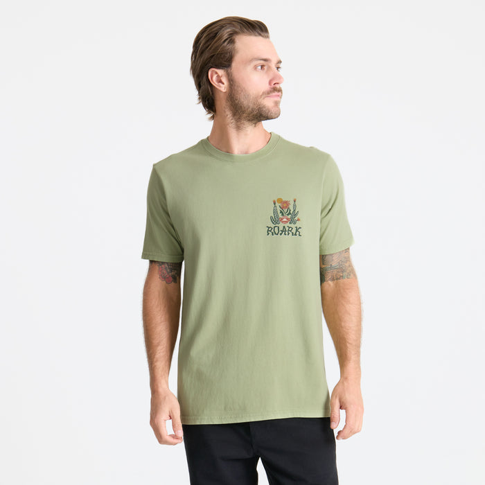Close-up detail of a Roark active shirt featuring durable fabric sleeves and practical pocket design, perfect for outdoor adventures and travel.