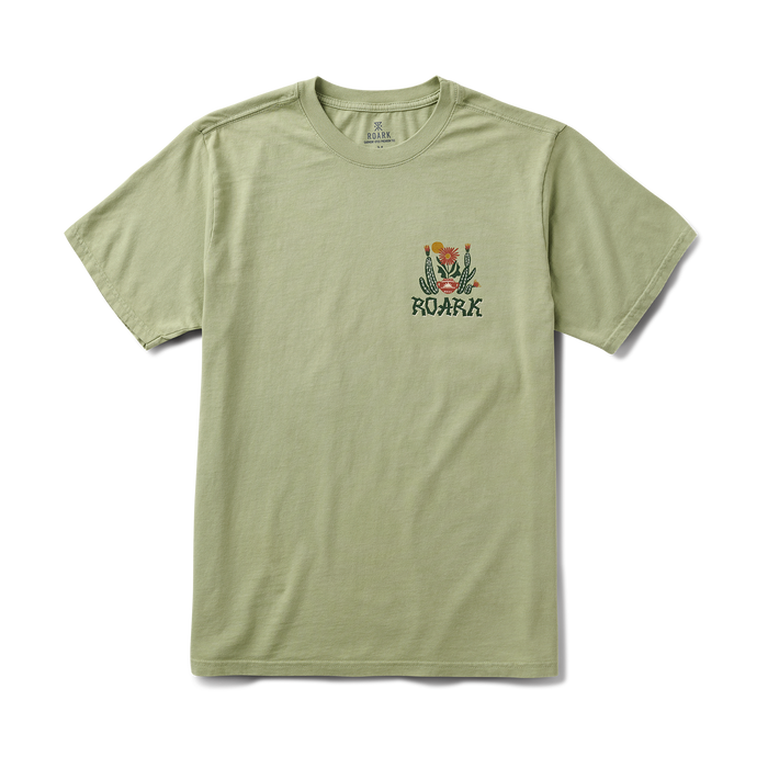 Close-up of a Roark active shirt sleeve featuring the distinctive logo and symbol, crafted from high-quality textiles for outdoor adventures