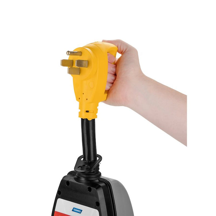 Hand Holding Yellow 50 Amp RV Plug - Usage Demonstration | United RV Parts