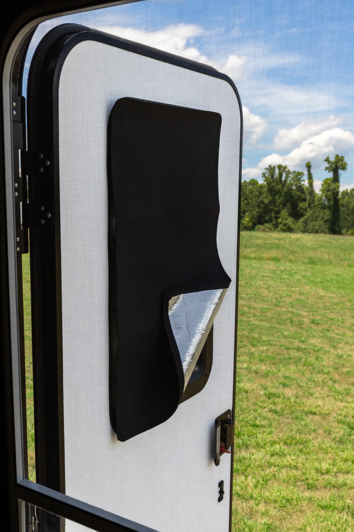 Black Camco 45148 Light Blocking Door Shade - Outdoor Application View | United RV Parts