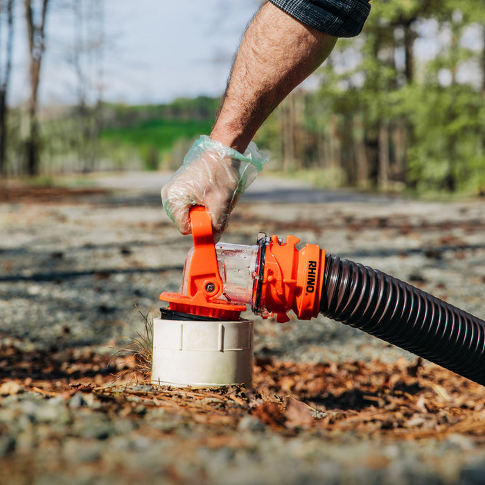 Camco Rhino Sewer Adapter Connected to RV Dump Station - In Use Application | United RV Parts